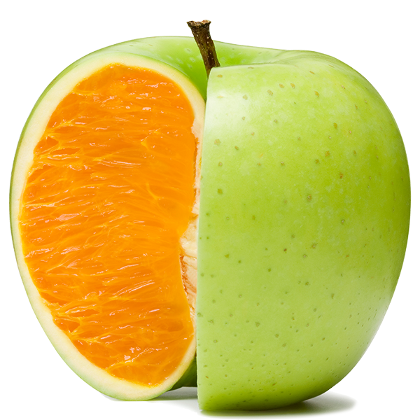 exterior of a green apple with a cutaway showing the inside of an orange