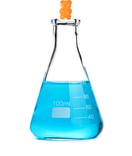 a gummy bear on top of a flash with blue liquid